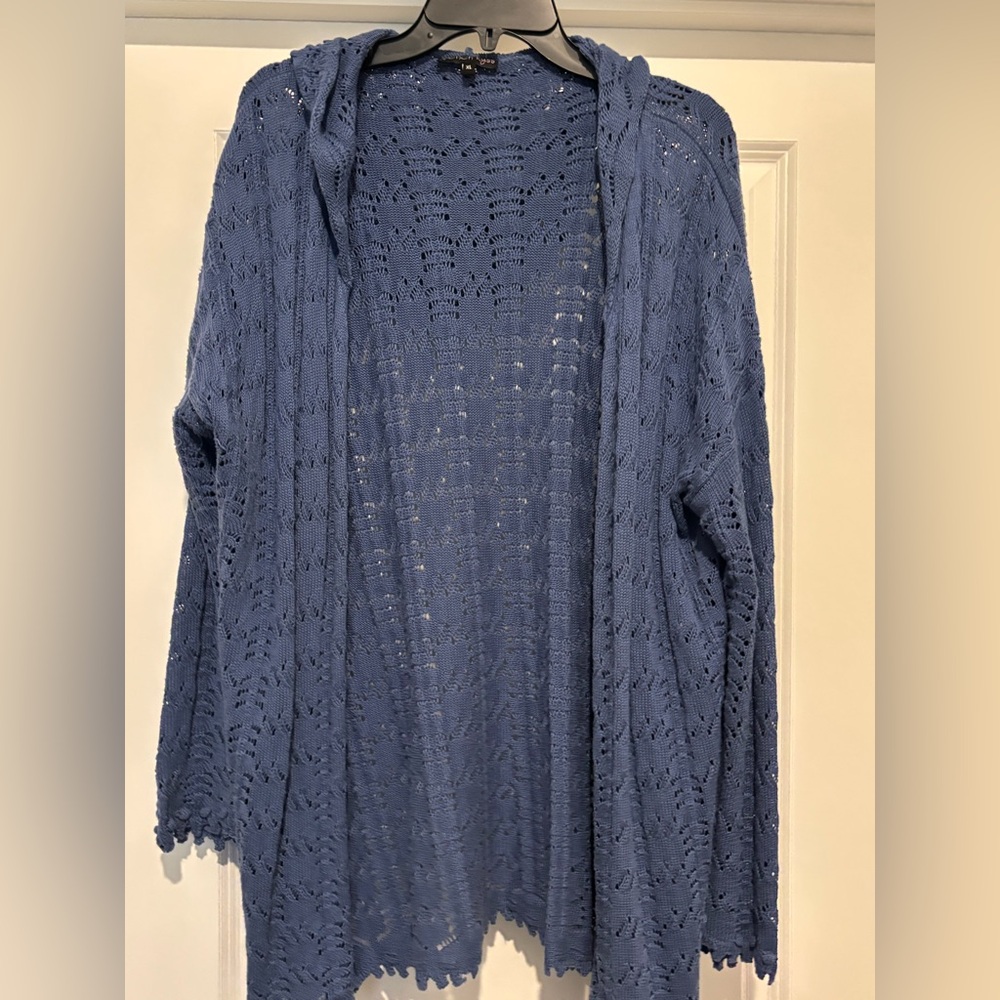 Blue knit cardigan with a hood.